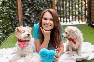 PETstock Ambassador and Dog Behaviourist, Lara Shannon with her two dogs for Animal Friendly Life's pet-safe Easter tips