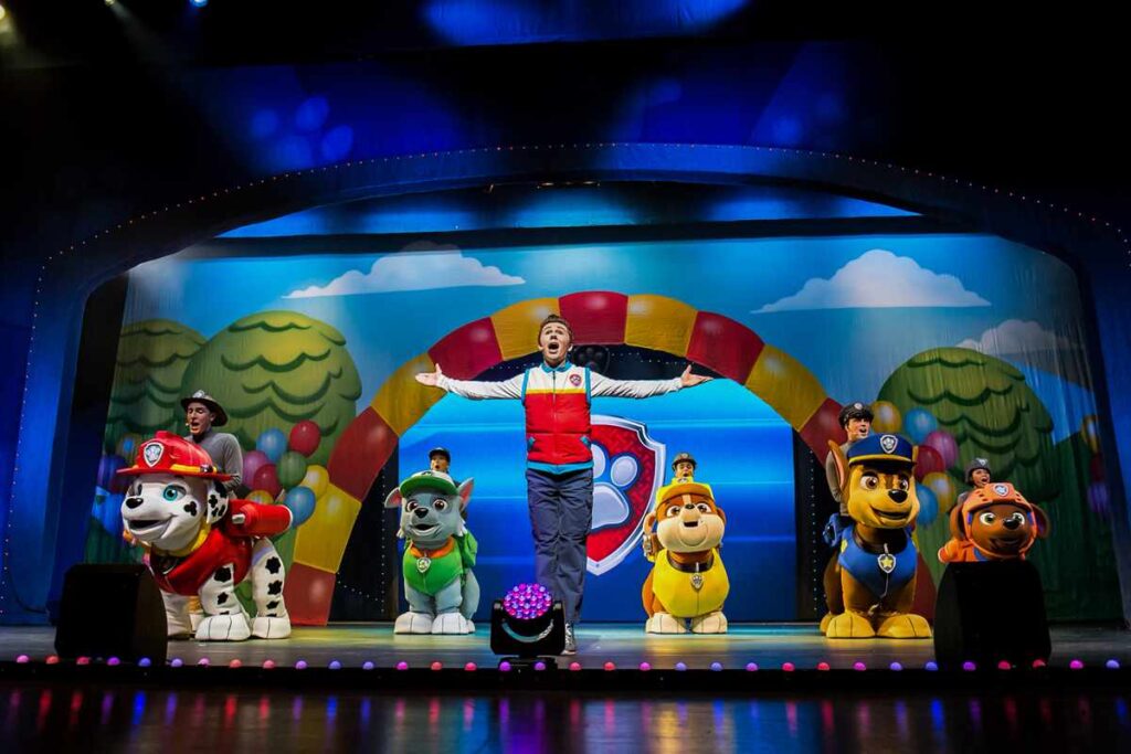 A photo of the crew on stage with the PAW Patrol live show