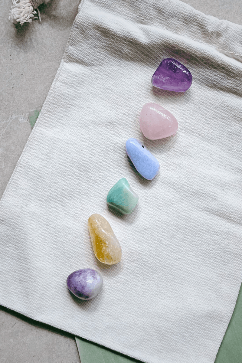 Flat lay image of 6 crystals for Animal Friendly Life products - healing crystals for dogs and crystals for pet anxiety