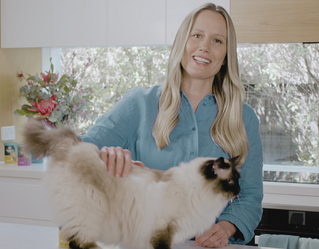 Dr Claire Jenkins from Breeder's Choice with cat for how to keep your cat healthy and happy during winter